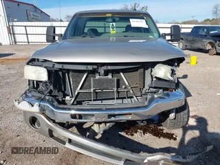 2003 GMC Sierra 1500HD SLE z VIN 1GTGK13U43F230834, wystawiony jako IAAI lot #41281221 z przebiegiem 213 362 mil mil oraz . Historia ofert i sprzedaży dostępna na DreamBid. Obrazek 13.