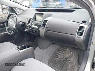 2005 Toyota Prius with VIN JTDKB20U853110933, listed as a IAAI auction lot 42049592 with 158,217 mi miles. Bid and sale history available at carsss.com. Image 5.