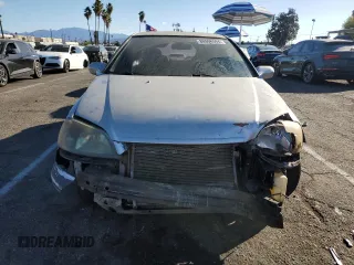 2001 Honda Civic LX with VIN 1HGEM21581L007005, listed as a Copart auction lot 80998594 with 0 mi miles and Salvage Title. Bid and sale history available at carsss.com. Image 5.