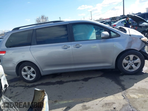 2012 Toyota Sienna LE AAS with VIN 5TDKK3DC1CS264239, listed as a IAAI auction lot 41839022 with 221,769 mi miles. Bid and sale history available at carsss.com. Image 13.