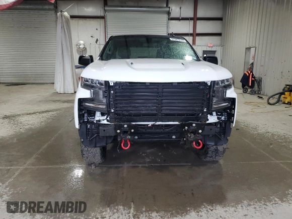 2021 Chevrolet Silverado 1500 LT Trail Boss with VIN 1GCPYFEL8MZ444404, listed as a Copart auction lot 47567215 with 10,384 mi miles and Salvage Title. Bid and sale history available at DreamBid. Image 5.