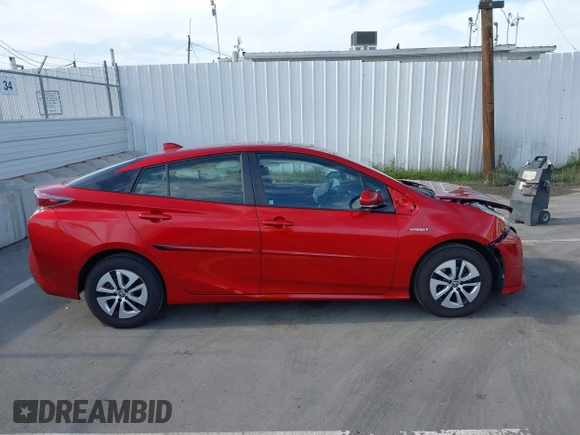 2016 Toyota Prius Four z VIN JTDKARFU3G3506953, wystawiony jako IAAI lot #42239553 z przebiegiem 63 011 mil mil oraz . Historia ofert i sprzedaży dostępna na DreamBid. Obrazek 13.