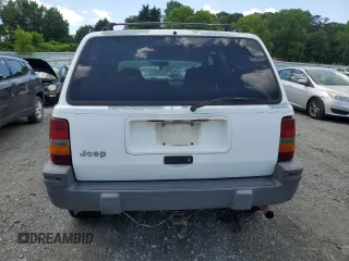 1995 Jeep Grand Cherokee Laredo с VIN 1J4GZ58S5SC724222, выставлен на аукционе Copart как лот 57837155 с пробегом 246 303 миль миль и Списание • Salvage title. История ставок и продаж доступна на DreamBid. Изображение 6.