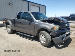 2006 Ford F-150 STX with VIN 1FTRX02W06KB84129, listed as a Copart auction lot 60349115 with 132,768 mi miles and Salvage title. Bid and sale history available at DreamBid. Image 4.