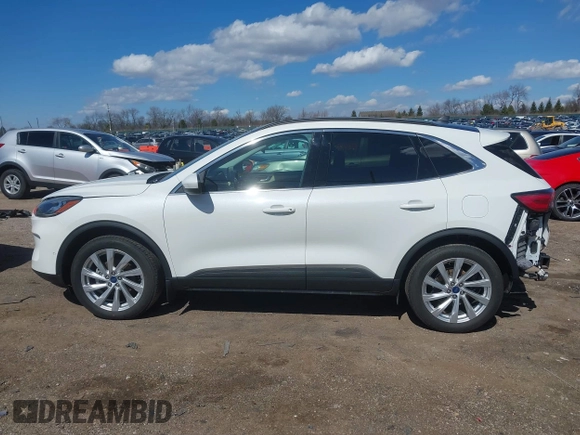 2022 Ford Escape Titanium with VIN 1FMCU9J93NUA99685, listed as a IAAI auction lot 41867437 with 36,987 mi miles and . Bid and sale history available at DreamBid. Image 15.