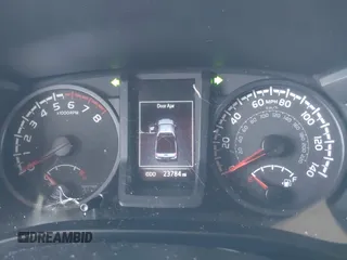 2022 Toyota Tacoma SR with VIN 3TYRX5GN0NT063643, listed as a IAAI auction lot 42368482 with 23,784 mi miles and . Bid and sale history available at DreamBid. Image 7.