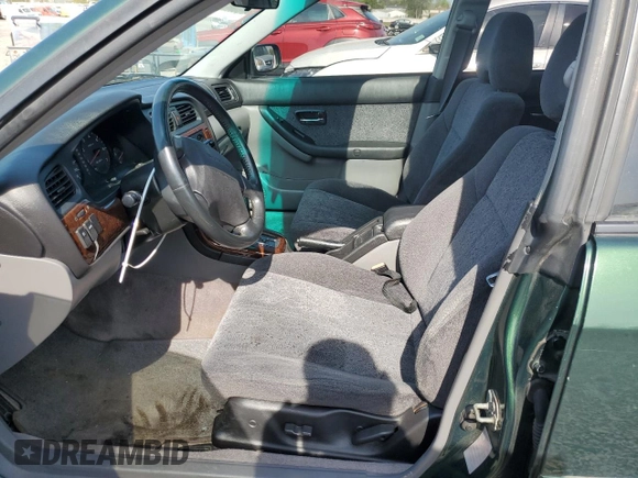 2000 Subaru Legacy with VIN 4S3BH6452Y7305352, listed as a Copart auction lot 54351125 with 92,990 mi miles and Salvage title. Bid and sale history available at DreamBid. Image 7.