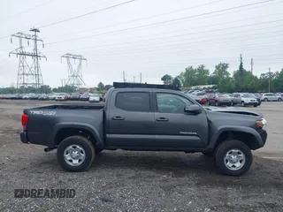 2017 Toyota Tacoma SR5 with VIN 3TMCZ5ANXHM089093, listed as a IAAI auction lot 42513711 with 86,022 mi miles and . Bid and sale history available at DreamBid. Image 13.