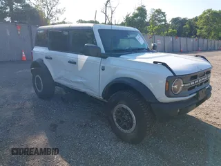 2023 Ford Bronco z VIN 1FMDE5DH2PLC10393, wystawiony jako IAAI lot #42524307 z przebiegiem 20 187 mil mil oraz . Historia ofert i sprzedaży dostępna na DreamBid. Obrazek 1.