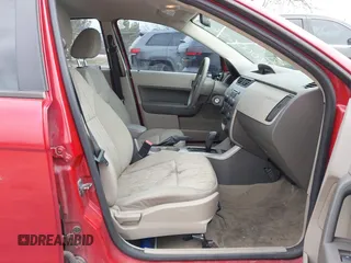 2009 Ford Focus SE with VIN 1FAHP35N89W246797, listed as a IAAI auction lot 42000656 with 150,646 mi miles. Bid and sale history available at carsss.com. Image 5.