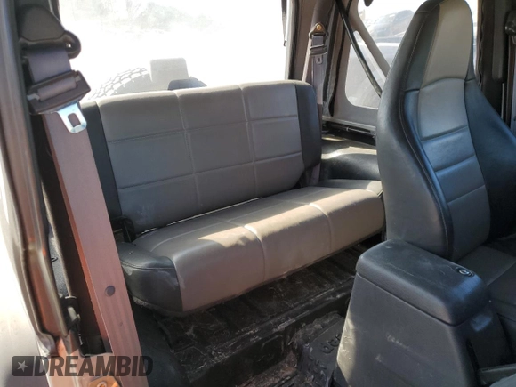 2000 Jeep Wrangler Sport with VIN 1J4FA49S4YP789348, listed as a Copart auction lot 50521365 with 0 mi miles and Salvage Title. Bid and sale history available at carsss.com. Image 11.