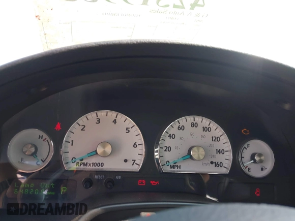 2003 Ford Thunderbird Deluxe z VIN 1FAHP60A53Y101461, wystawiony jako IAAI lot #42519933 z przebiegiem 64 820 mil mil oraz . Historia ofert i sprzedaży dostępna na DreamBid. Obrazek 7.