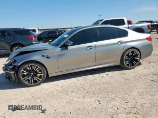 2018 BMW M5 z VIN WBSJF0C55JB282449, wystawiony jako Copart lot #60221525 z przebiegiem 22 112 mil mil oraz Szkoda całkowita • Salvage title. Historia ofert i sprzedaży dostępna na DreamBid. Obrazek 1.