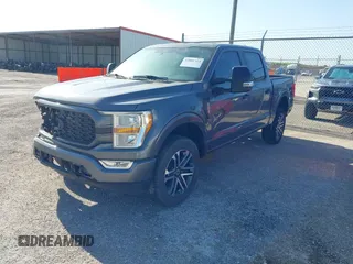 2023 Ford F-150 XL with VIN 1FTFW1E51PKF71272, listed as a IAAI auction lot 42001314 with 5,314 mi miles. Bid and sale history available at carsss.com. Image 2.