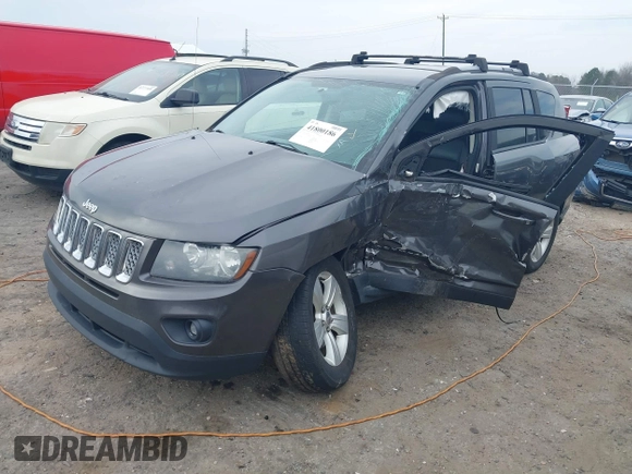 2016 Jeep Compass Latitude with VIN 1C4NJDEB4GD687300, listed as a IAAI auction lot 41800186 with 169,374 mi miles. Bid and sale history available at carsss.com. Image 2.