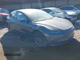 2023 Tesla Model 3 with VIN 5YJ3E1EA9PF548502, listed as a IAAI auction lot 41160649 with 28,759 mi miles. Bid and sale history available at carsss.com. Image 1.