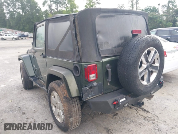 2008 Jeep Wrangler Sahara with VIN 1J4FA54118L653044, listed as a IAAI auction lot 42557244 with 152,072 mi miles and . Bid and sale history available at DreamBid. Image 3.