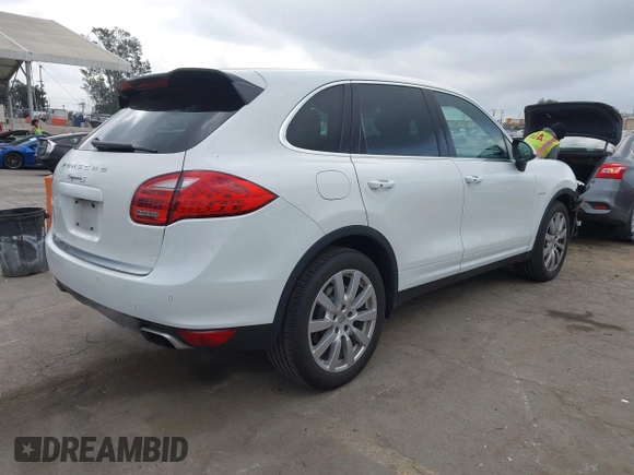 2014 Porsche Cayenne S Hybrid with VIN WP1AE2A28ELA51123, listed as a IAAI auction lot 42091475 with 41,341 mi miles and . Bid and sale history available at DreamBid. Image 4.