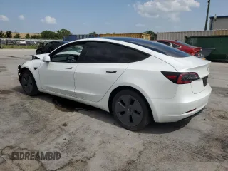 2023 Tesla Model 3 with VIN 5YJ3E1EA8PF499535, listed as a Copart auction lot 59974115 with 18,365 mi miles and Salvage title. Bid and sale history available at DreamBid. Image 2.