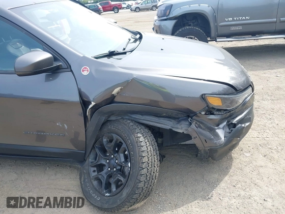 2019 Jeep Cherokee Trailhawk with VIN 1C4PJMBX2KD231734, listed as a IAAI auction lot 42235469 with 104,565 mi miles and . Bid and sale history available at DreamBid. Image 6.