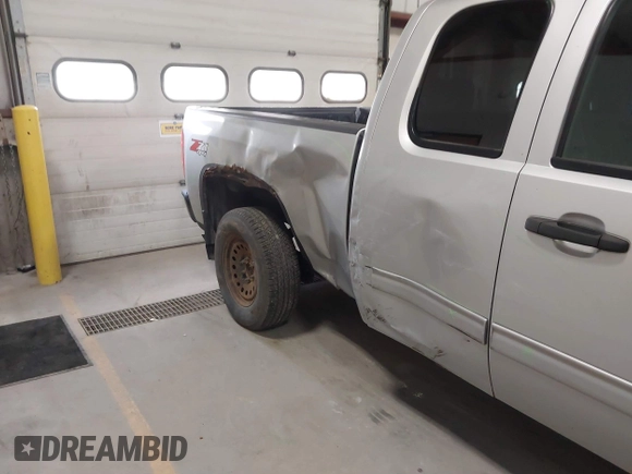 2013 Chevrolet Silverado 1500 LT with VIN 1GCRKSE73DZ328002, listed as a IAAI auction lot 41842745 with 124,496 mi miles and . Bid and sale history available at DreamBid. Image 6.