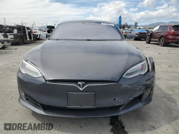2016 Tesla Model S 70 with VIN 5YJSA1E1XGF149430, listed as a Copart auction lot 51339015 with 104,917 mi miles and Salvage title. Bid and sale history available at DreamBid. Image 5.