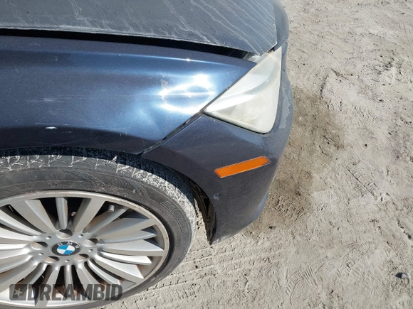 2014 BMW 3 Series 335i with VIN WBA3A9C54EF477943, listed as a IAAI auction lot 41632554 with 102,273 mi miles. Bid and sale history available at carsss.com. Image 6.