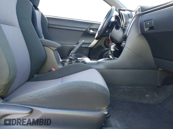 2016 Scion tC with VIN JTKJF5C71GJ020893, listed as a IAAI auction lot 41891029 with 76,341 mi miles. Bid and sale history available at carsss.com. Image 5.
