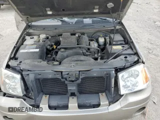 2002 GMC Envoy SLT with VIN 1GKDT13SX22380133, listed as a Copart auction lot 69816144 with 90,060 mi miles and Salvage Title. Bid and sale history available at DreamBid. Image 12.