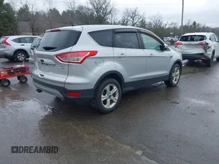 2015 Ford Escape SE with VIN 1FMCU9GX0FUB99881, listed as a IAAI auction lot 41919660 with 138,561 mi miles. Bid and sale history available at carsss.com. Image 4.