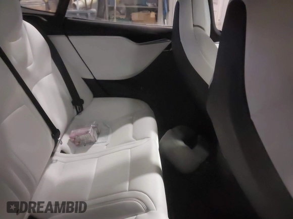 2017 Tesla Model S 100D with VIN 5YJSA1E23HF232059, listed as a IAAI auction lot 41394046 with 84,052 mi miles and . Bid and sale history available at DreamBid. Image 8.