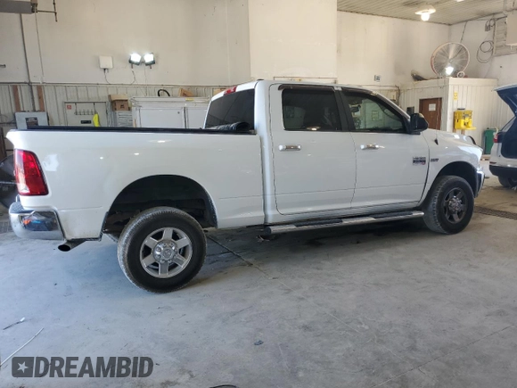 2012 Ram 2500 SLT with VIN 3C6TD5DT5CG112948, listed as a Copart auction lot 68581694 with 207,960 mi miles and Salvage title. Bid and sale history available at DreamBid. Image 3.
