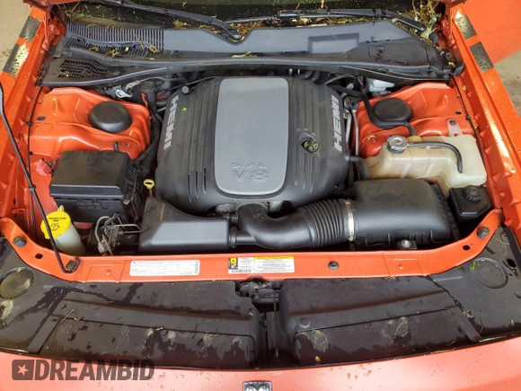 2009 Dodge Challenger R/T z VIN 2B3LJ54T09H593106, wystawiony jako Copart lot #58562535 z przebiegiem 134 380 mil mil oraz Szkoda całkowita • Salvage title. Historia ofert i sprzedaży dostępna na DreamBid. Obrazek 11.