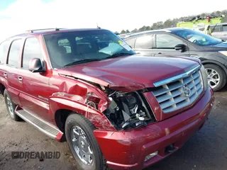2003 Cadillac Escalade z VIN 1GYEC63T53R146068, wystawiony jako IAAI lot #41634405 z przebiegiem 272 263 mil mil oraz . Historia ofert i sprzedaży dostępna na DreamBid. Obrazek 6.