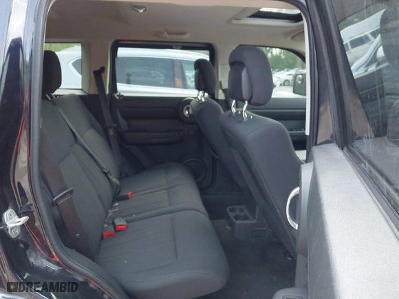 2011 Dodge Nitro Heat with VIN 1D4PU4GX2BW514237, listed as a IAAI auction lot 42109697 with 151,365 mi miles. Bid and sale history available at carsss.com. Image 8.
