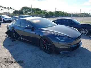 2023 Tesla Model S Plaid with VIN 5YJSA1E62PF530538, listed as a IAAI auction lot 41553415 with 31,392 mi miles and . Bid and sale history available at DreamBid. Image 1.