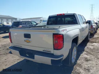 2014 Chevrolet Silverado 1500 High Country with VIN 3GCUKTEC2EG317846, listed as a IAAI auction lot 41763051 with 130,862 mi miles. Bid and sale history available at carsss.com. Image 4.