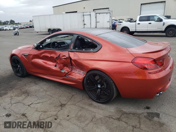 2014 BMW M6 z VIN WBSLX9C52ED160071, wystawiony jako Copart lot #77452554 z przebiegiem 64 814 mil mil oraz Szkoda całkowita • Salvage title. Historia ofert i sprzedaży dostępna na DreamBid. Obrazek 2.