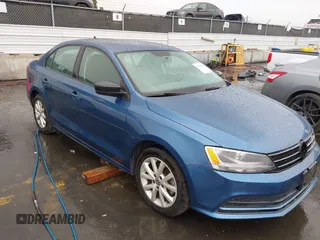 2015 Volkswagen Jetta Sedan 1.8T SE with VIN 3VWD17AJ5FM310694, listed as a IAAI auction lot 41735569 with 147,232 mi miles. Bid and sale history available at carsss.com. Image 1.