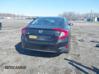 2018 Honda Civic LX with VIN 19XFC2F58JE042456, listed as a IAAI auction lot 41823195 with 45,291 mi miles and . Bid and sale history available at DreamBid. Image 17.