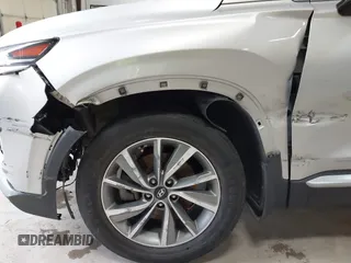 2019 Hyundai Santa Fe SEL with VIN 5NMS33AD3KH119117, listed as a IAAI auction lot 40968190 with 100,350 mi miles and . Bid and sale history available at DreamBid. Image 6.
