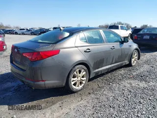 2013 Kia Optima EX with VIN 5XXGN4A74DG174838, listed as a IAAI auction lot 41621839 with 227,173 mi miles. Bid and sale history available at carsss.com. Image 4.