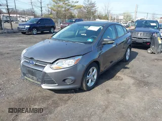 2013 Ford Focus SE with VIN 1FADP3F26DL135579, listed as a IAAI auction lot 41951255 with 100,000 mi miles and . Bid and sale history available at carsss.com. Image 2.
