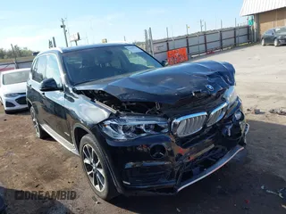 2016 BMW X5 xDrive35i with VIN 5UXKR0C54G0U11822, listed as a IAAI auction lot 41909821 with 149,460 mi miles. Bid and sale history available at carsss.com. Image 1.