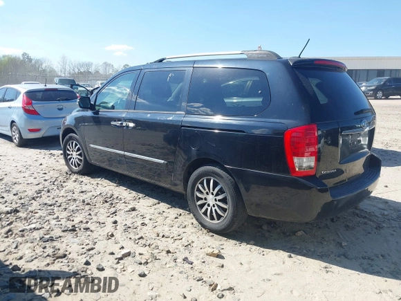 2011 Kia Sedona EX with VIN KNDMH4C76B6398261, listed as a IAAI auction lot 41894696 with 180,297 mi miles. Bid and sale history available at carsss.com. Image 3.