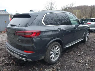 2023 BMW X5 xDrive40i with VIN 5UXCR6C07P9N61205, listed as a IAAI auction lot 42010313 with 34,127 mi miles. Bid and sale history available at carsss.com. Image 4.
