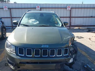 2018 Jeep Compass Altitude with VIN 3C4NJDBBXJT290891, listed as a IAAI auction lot 41741412 with 182,716 mi miles and . Bid and sale history available at carsss.com. Image 11.