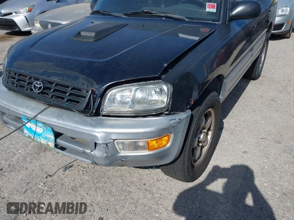 1998 Toyota RAV4 with VIN JT3GP10V7W7037711, listed as a IAAI auction lot 42081313 with 233,554 mi miles and . Bid and sale history available at DreamBid. Image 6.
