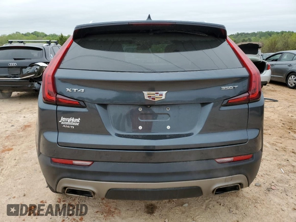 2021 Cadillac XT4 AWD Premium Luxury z VIN 1GYFZDR4XMF000937, wystawiony jako Copart lot #52406055 z przebiegiem 46 881 mil mil oraz Szkody całkowita. Historia ofert i sprzedaży dostępna na DreamBid. Obrazek 6.
