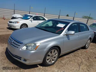 2005 Toyota Avalon XL with VIN 4T1BK36B95U047763, listed as a IAAI auction lot 41996438 with 224,315 mi miles. Bid and sale history available at carsss.com. Image 2.